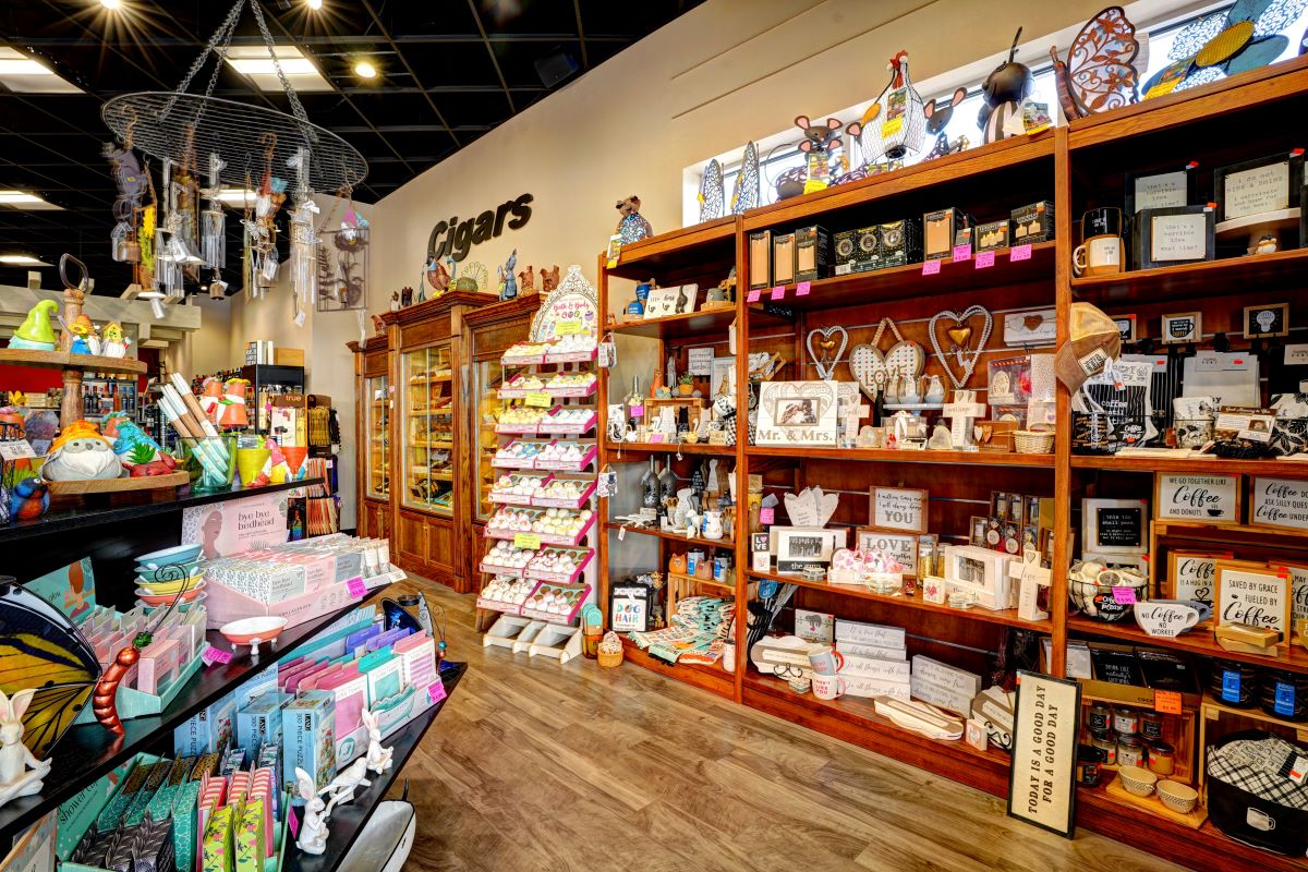 Chocolate Bar - case with trays - closeup - all kind of gourmet chocolate from large peanut butter cups, to truffles, turtles, and more.